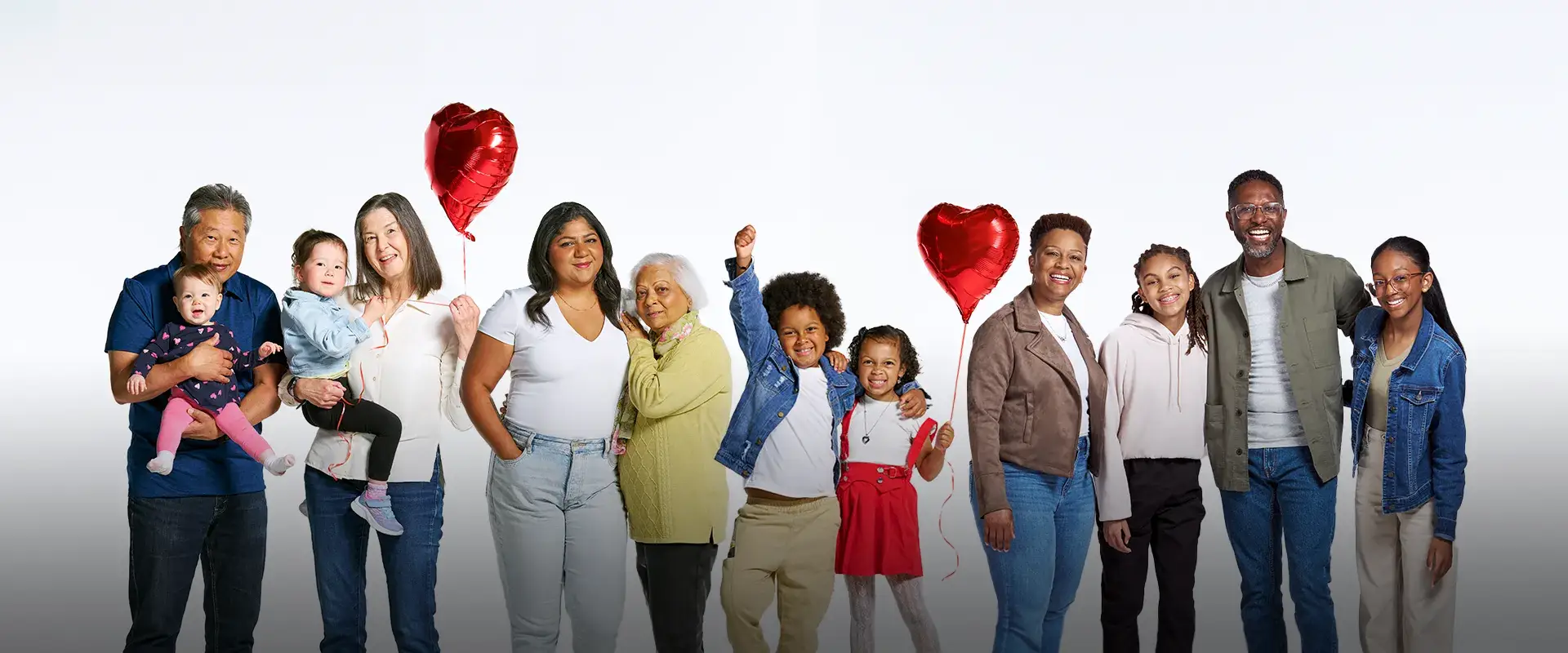 A group photo of three families who have lived experience with heart disease and stroke.